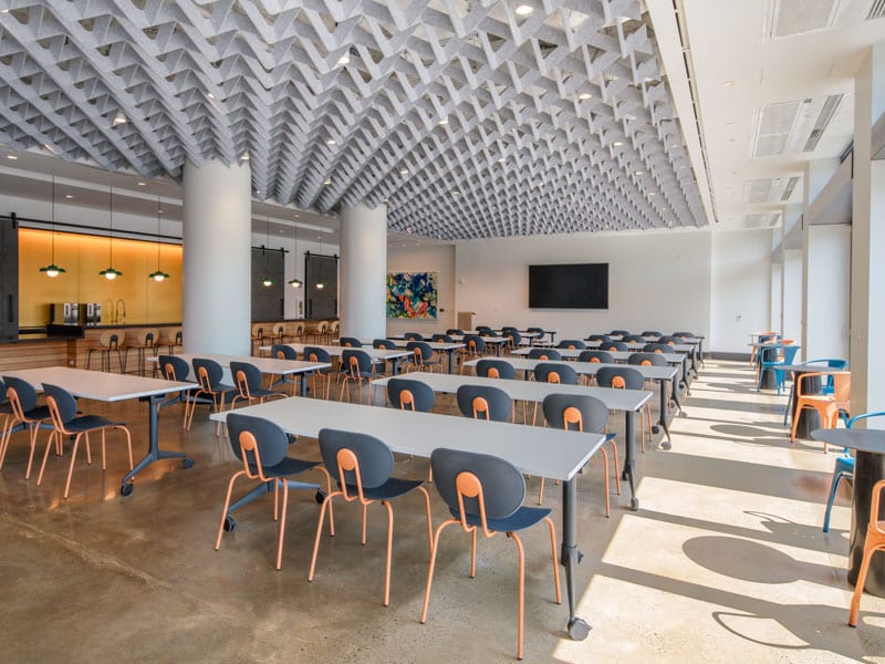 Collaborative conference space with a stylish, grid-patterned ceiling and natural light at 40 Thorndike