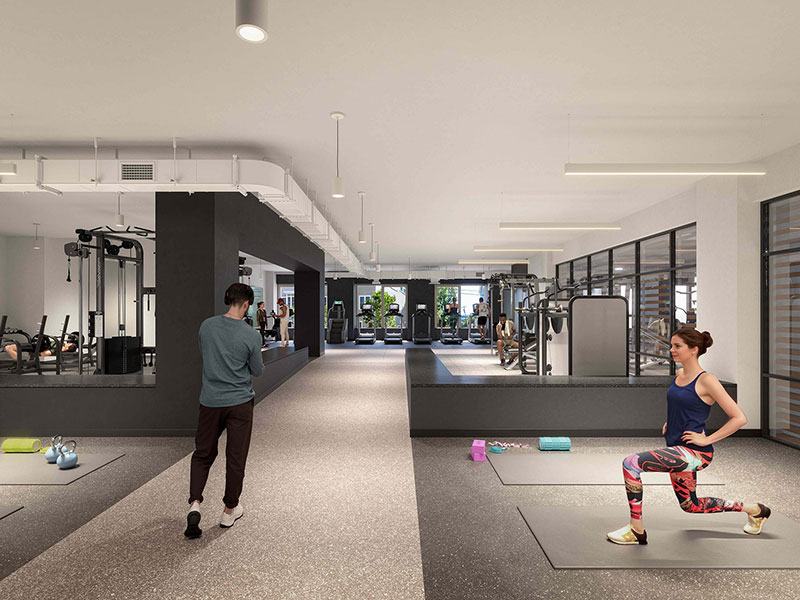 Modern fitness center at 40 Thorndike with gym equipment and people exercising