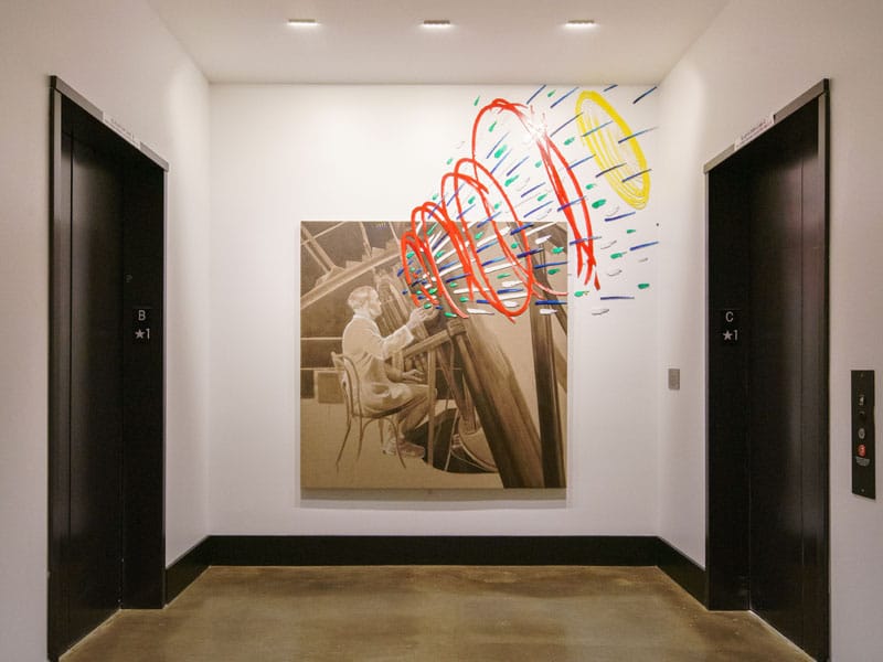 Art installation using colored threads decorating the lobby space of 40 Thorndike