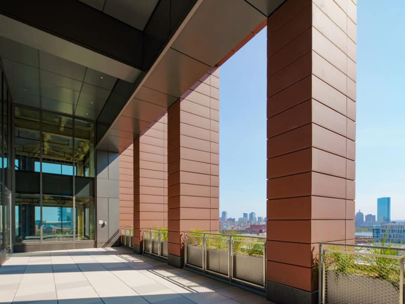 Cambridge skyline from the rooftop terrace of 40 Thorndike, featuring outdoor seating